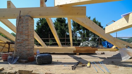 construction of the house. construction site - renovation of a roof - wooden beams