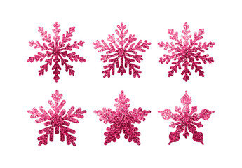 Set of pink snowflakes in glitter. Collection of decorative elements for the Christmas holiday. Vector illustration