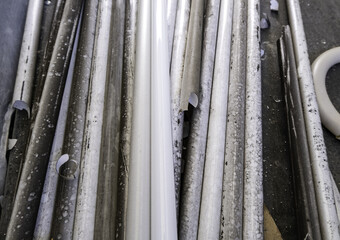 Fluorescent tubes in the trash