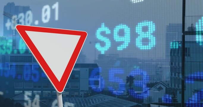 Animation of financial data processing over triangle road sign and city