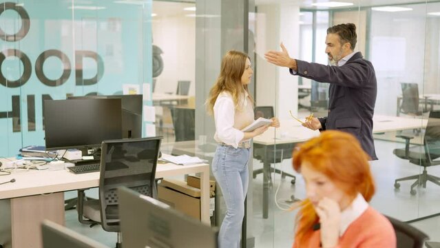 Boss yelling while partner prevents to fire an employee
