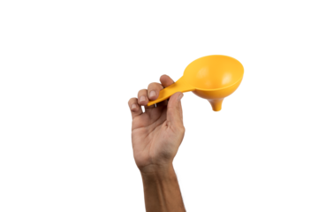 Black male hand holding a yellow kitchen funnel isolated, no background.