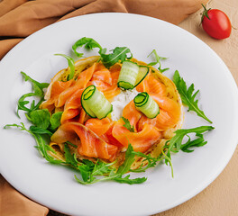 Homemade Pancakes with Salmon on plate