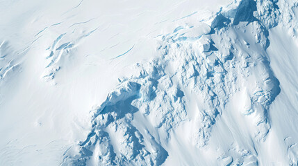 Top view of a completely snowed area with some thin cracks and few crumbling zones