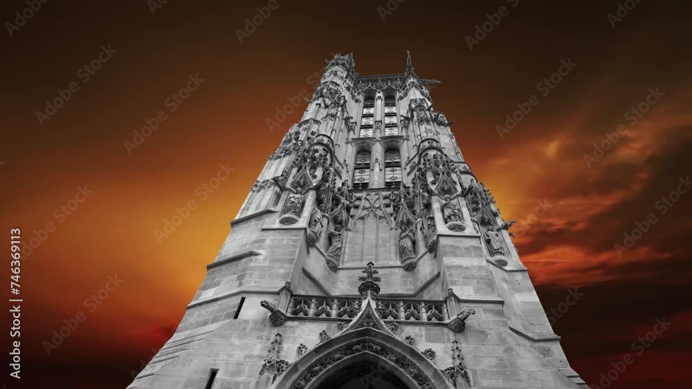 Wall mural Saint-Jacques Tower (Tour Saint-Jacques) against the background of the sunset. Located on Rivoli street, Paris, France. This 52 m Gothic tower (XVI century).  4K, time lapse, with zoom  