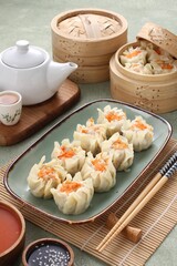 Very soft and tasty chicken dimsum served with spicy and sour sauce