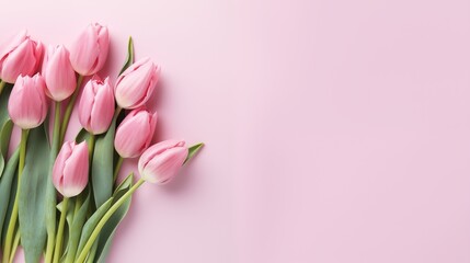 Top view of tulips lying on empty background