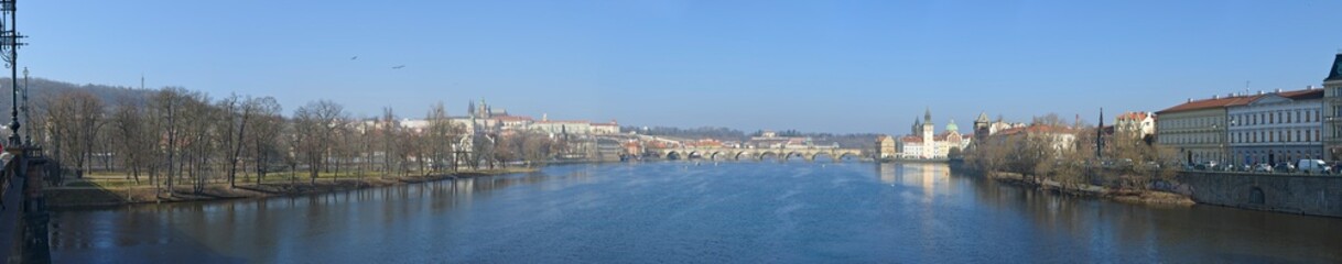 Fototapeta na wymiar Panoramic view along Vltava river towards Charles Bridge, Prague, Czech.