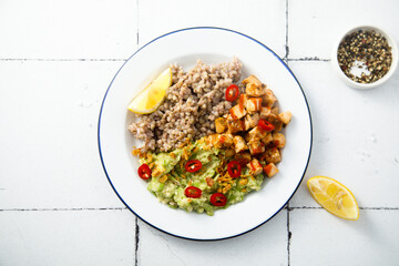 Green buckwheat with chicken and avocado mash