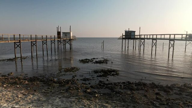 Vue a&eacute;rienne drone de carrelets en Charente-Maritime au coucher du soleil