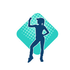 Silhouette of a slim sporty woman doing pilates exercise. Silhouette of a sporty female doing physical exercise. 