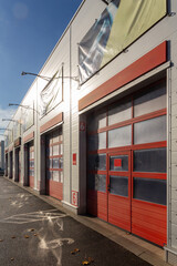 Building with a commercial vehicle repair shop with six garage doors.