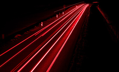 lights of cars driving at night. long exposure