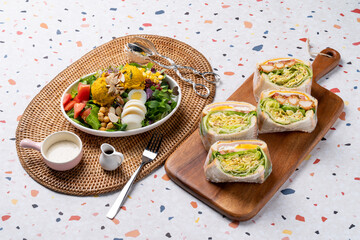 Salad, sandwich, ham, cheese, sweet pumpkin, almond, tomato, sprouts, vegetables, eggs, lettuce, sauce