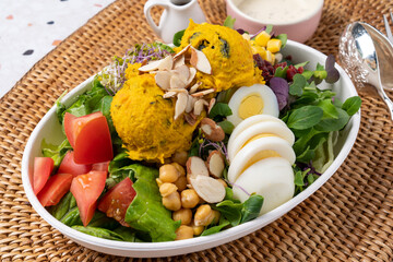 Salad, sandwich, ham, cheese, sweet pumpkin, almond, tomato, sprouts, vegetables, eggs, lettuce, sauce
