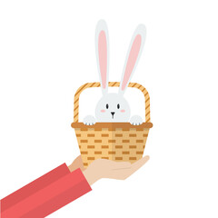 Hand holding basket with easter bunny - 746397925