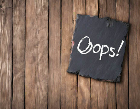 OOPS word inscription