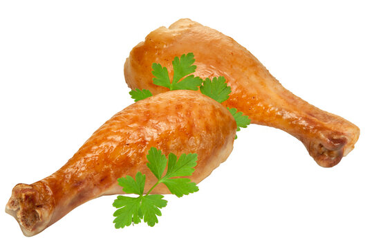 coxa de frango assado acompanhado de folhas de tempero isolado em fundo transparente