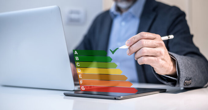 Energy efficiency application on laptop. Ecology and energy saving house concept. Home power rating