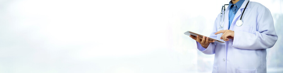 Doctor working on a digital tablet white spec background