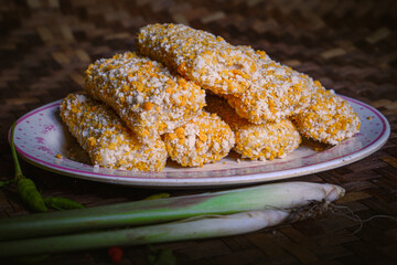 piles of uncooked rissoles, rissoles on a plate, fried rissoles.