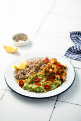 Green buckwheat with chicken and avocado mash