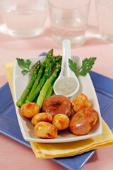 Candied potatoes and turnips with asparagus.