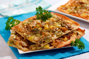 Pizza with vegetables and mushrooms.