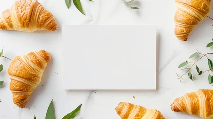 Foto op Canvas Croissant background with white board in the middle © Graphicgrow