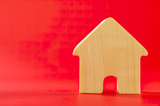 Wooden House on Red Background