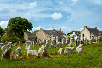 Standing stones (or menhirs) in the Menec alignment in Carnac, Morbihan, Brittany, France - obrazy, fototapety, plakaty