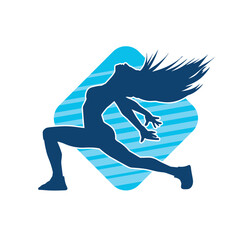 Silhouette of a slim female in dance pose. Silhouette of a woman dancing.