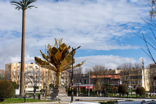 The golden lotus flower monument against the sky in Setif city, Algeria.
