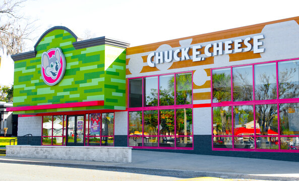 Ocala, FL 2-26-2024 Chuck E. Cheeses chain has officially been labeled as the first family restaurant to integrate food, entertainment, and an indoor arcade. exterior building with green red color