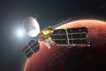 Technological satellite flies in orbit of the red planet Mars. Exploring the planet Mars. Surface of Mars with craters in stellar space with the sun. Mars Reconnaissance Orbiter - obrazy, fototapety, plakaty