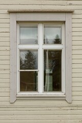 Fototapeta na wymiar Window on a old wood building.