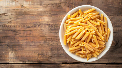Dried penne rigate pasta, or cylinder-shaped pasta.
