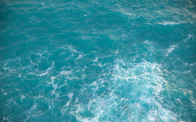 Overlooking the turquoise sea with wave and foam, Cinque Terre, Italy