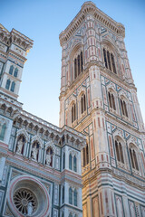 Fototapeta premium look up of the Cathedral of Santa Maria del Fiore and tower with blue sky, Florence, Italy