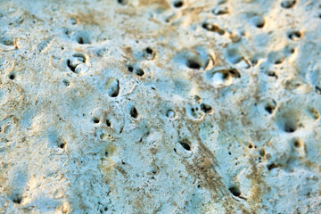 decorative coating with fine stone abrasive, dark background