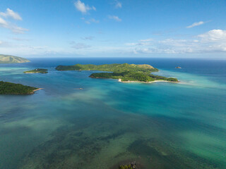 Fototapeta na wymiar Manamoc and Cabangajan Island with turquoise sea water. Santa Fe, Tablas, Romblon. Philippines.