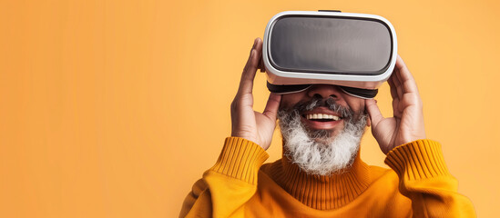Close up of a happy senior African American man wearing a virtual reality headset, copy space for text banner, mockup