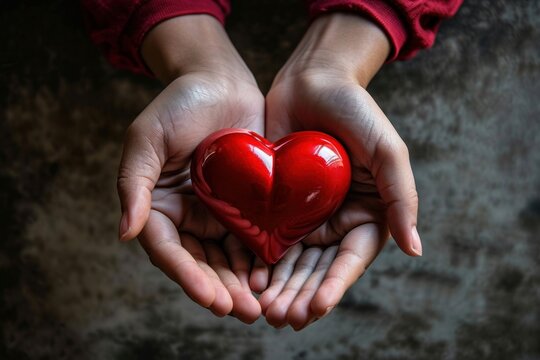 Woman holding red heart in hands. Love, help, social responsibility, donation, charity, volunteering, gratitude, appreciate, giving tuesday, world heart day, Generative AI