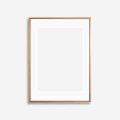 Thin vertical rose gold vintage frame with mat on a white background
