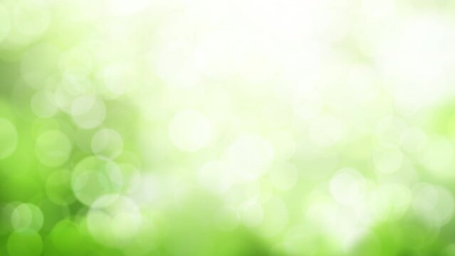 Soft green light creates a blurred, abstract background with a bokeh effect.