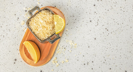 Lemon sea salt on a light background, Long banner format. top view. copy space for text