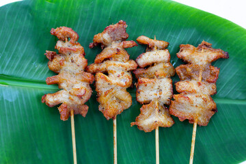 Fried pork on skewers. Delicious food
