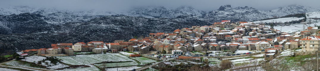 Fototapeta na wymiar View from the village of Pitoes das Junias in a snowy day. Peneda-Geres National Park. Municipality of Montalegre. Northern Portugal.