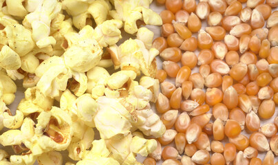 Caramel Popcorn is isolated on wooden background. Salted popcorn on the wooden table.