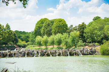 Summer Green Trees and Water in Pearl Spring Scenic Area, Nanjing City, Jiangsu Province, China